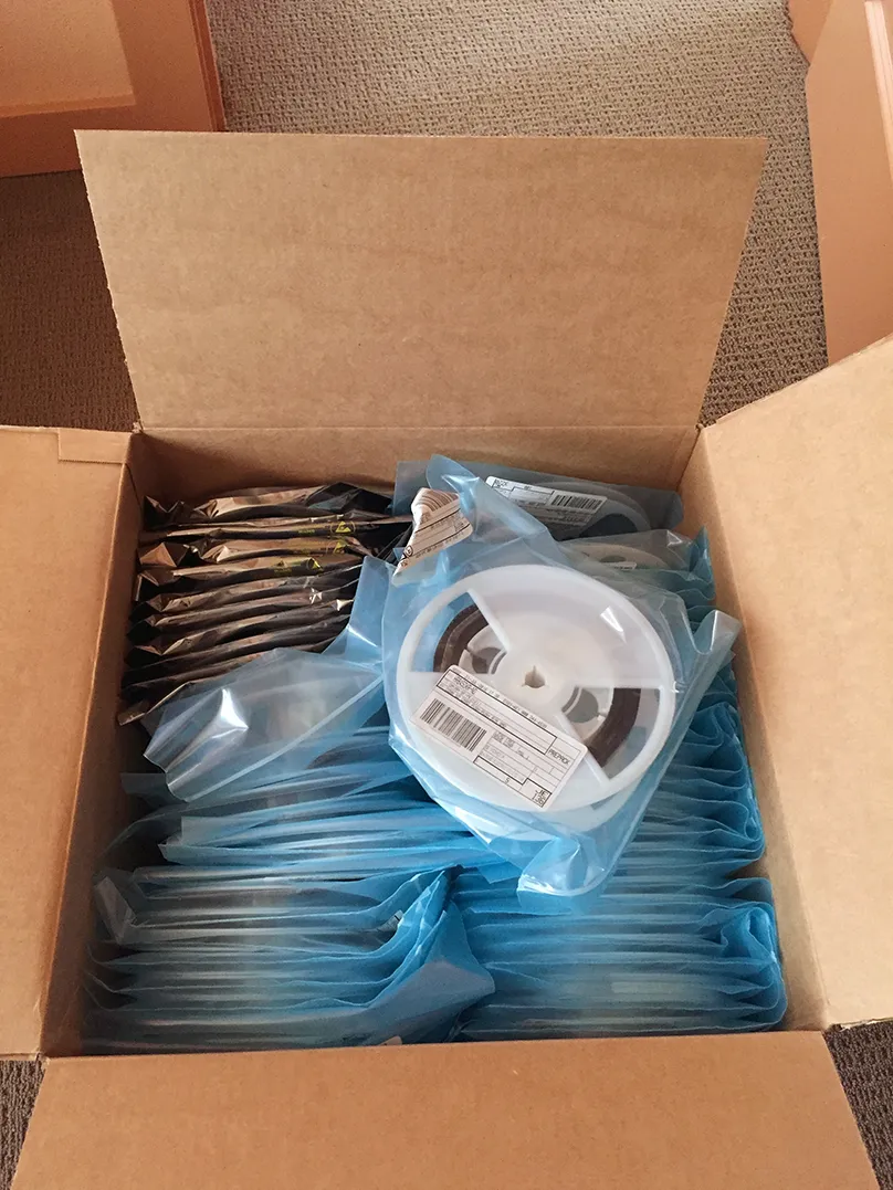 Reels of components boxed for the assembly house